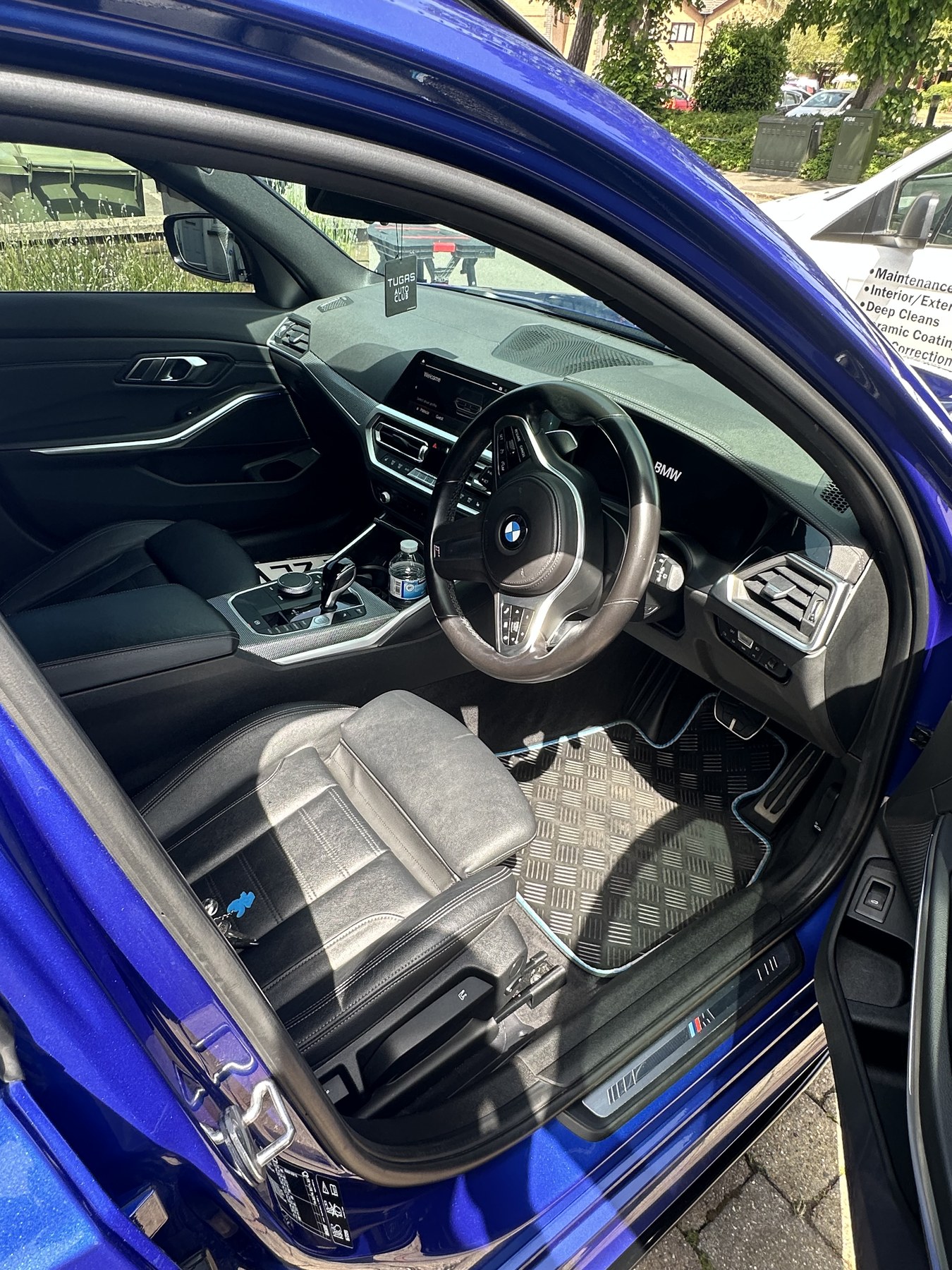 Blue BMW interior detail after cleaning