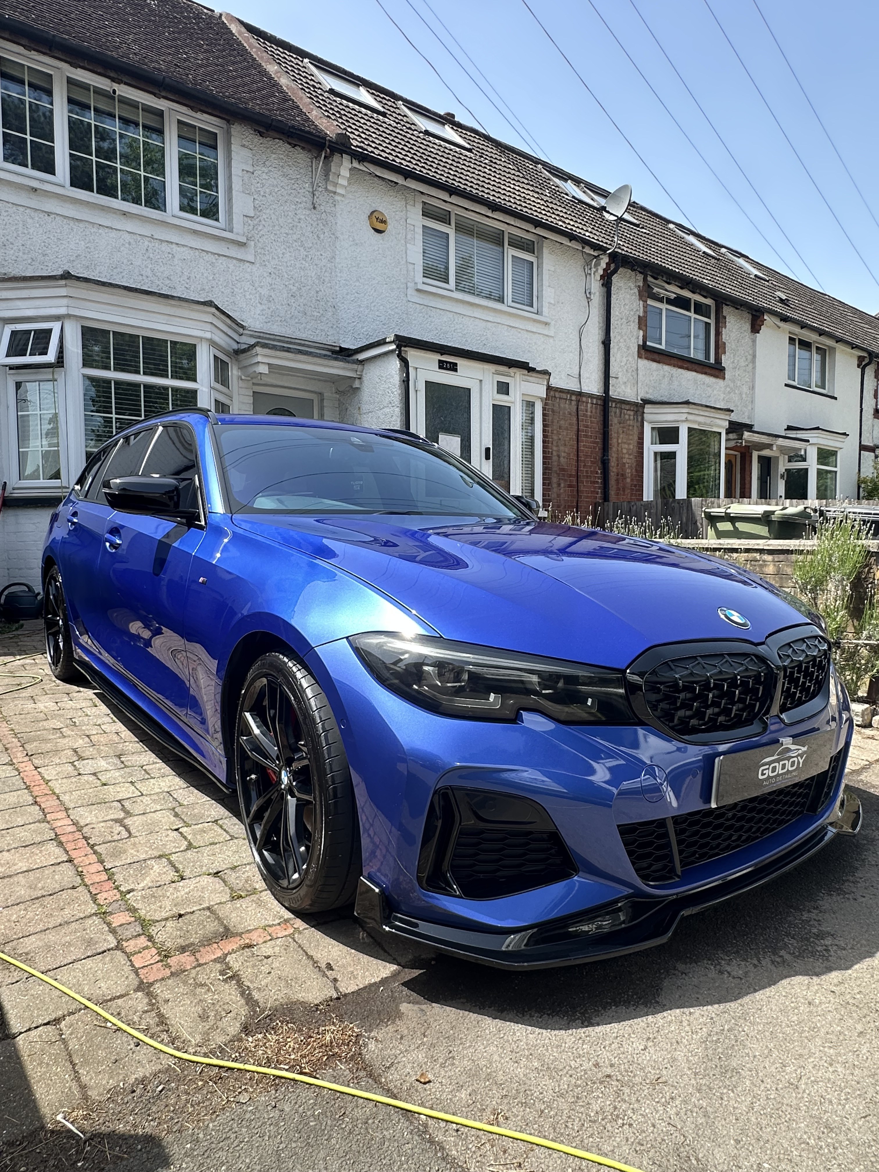 Blue BMW front angle after detailing