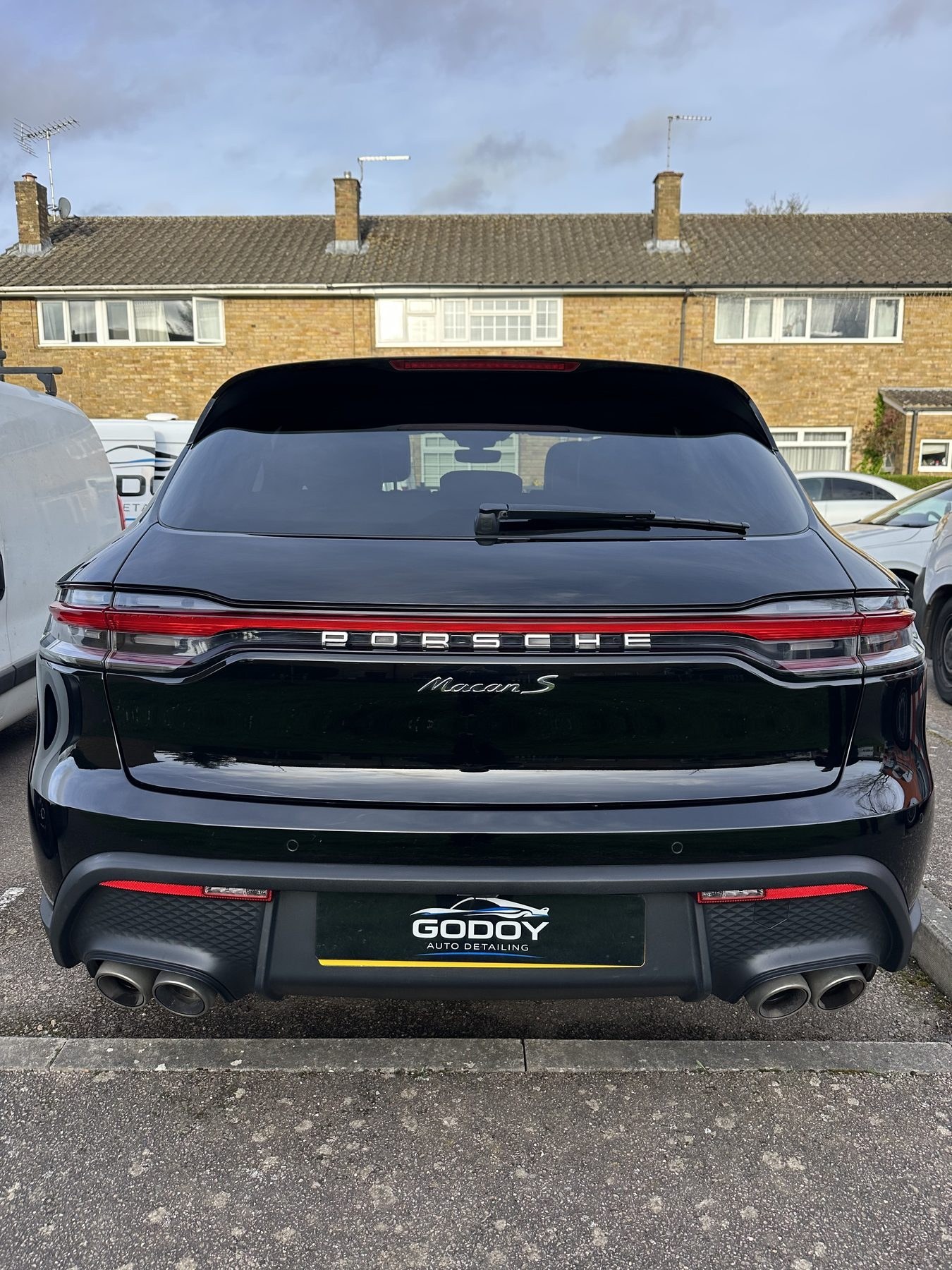 Black Porsche rear finish after detailing